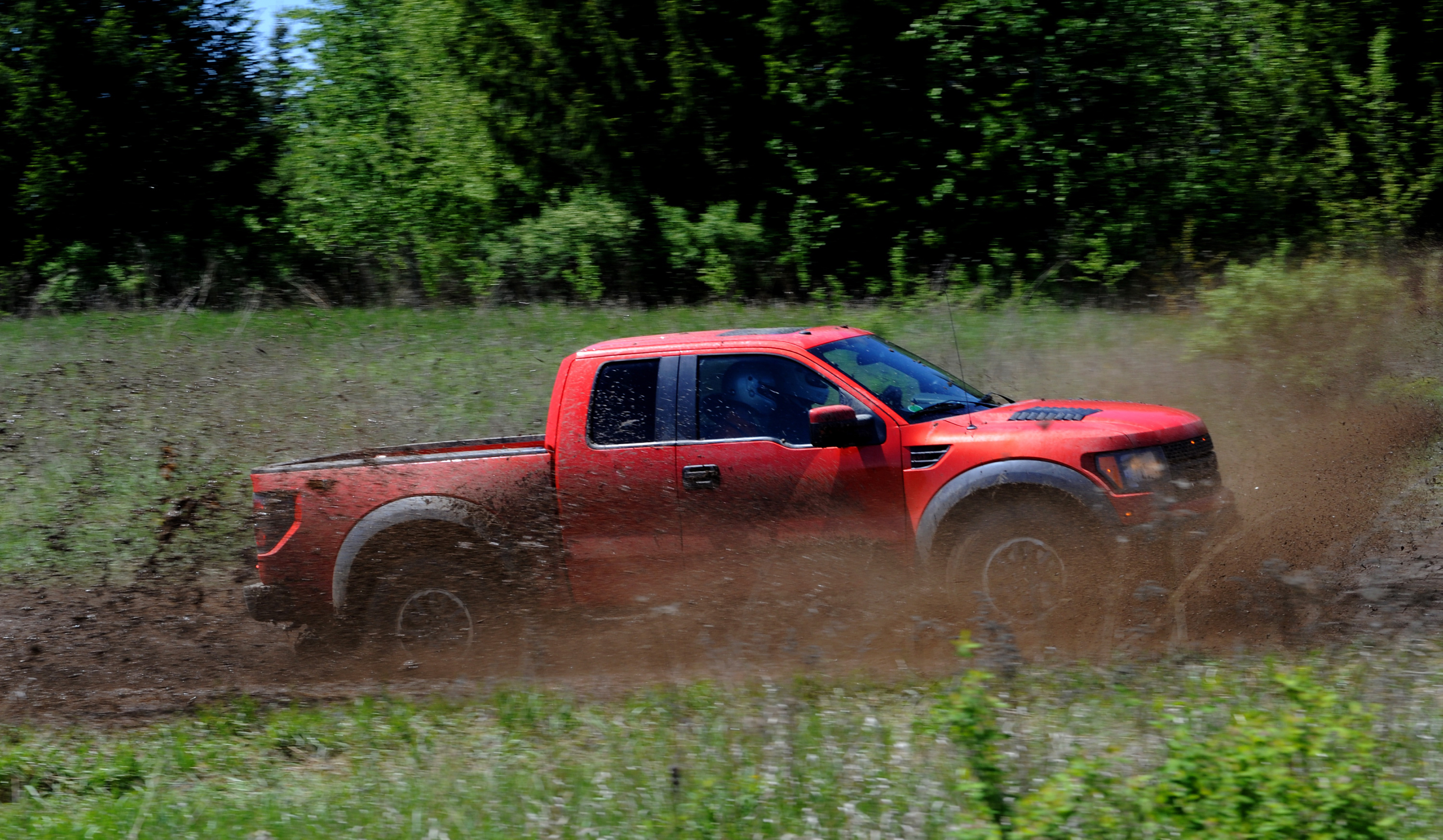 ROMEO, MI. MAY 14, 2010--2010 F-150 SVT Raptor--The 2010 F-150 SVT Raptor, equipped with the optional all-new 6.2-liter engine, getting dirty in it's natural environment. Photo by: Sam VarnHagen/Ford Motor Co. (05/15/2010)